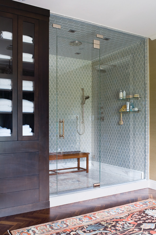 Photo of a transitional bathroom in Los Angeles with green tile, ceramic tile, an alcove shower and a shower seat.