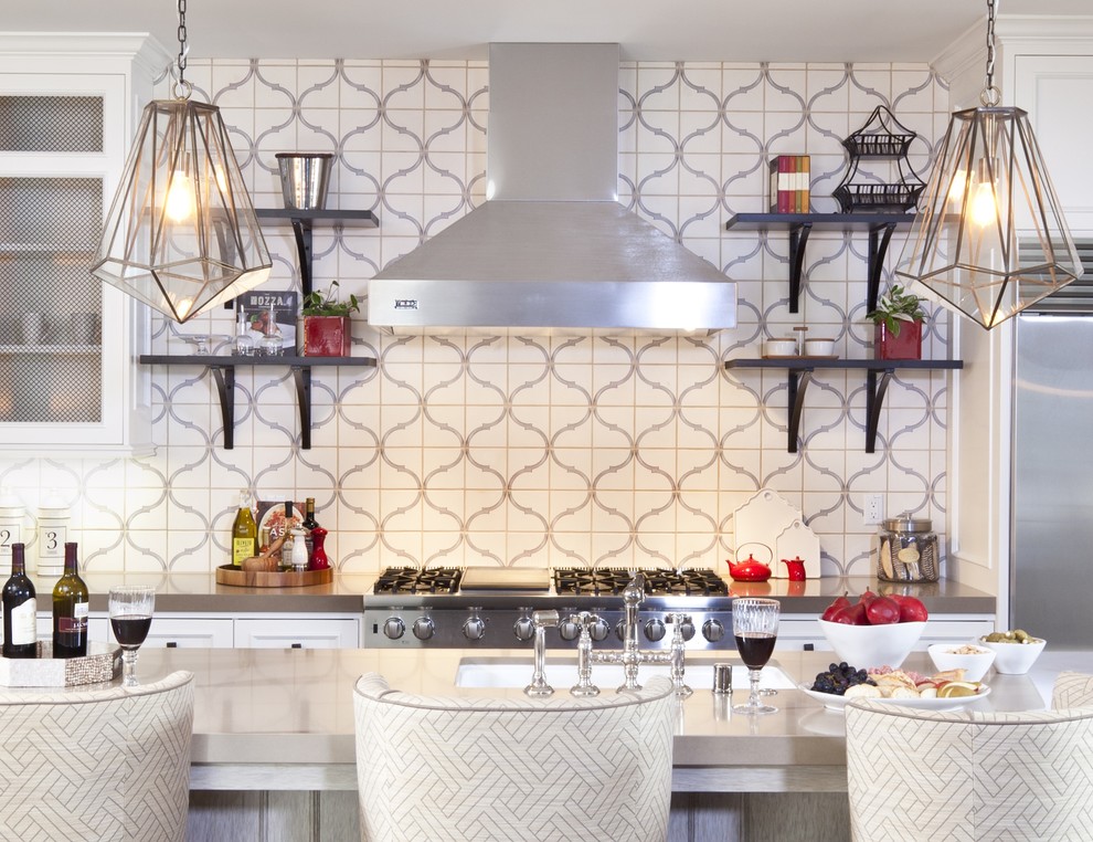 Design ideas for a large mediterranean galley separate kitchen in Orange County with stainless steel appliances, white cabinets, slate floors, with island, an undermount sink, multi-coloured splashback, beaded inset cabinets, quartz benchtops, cement tile splashback and grey floor.