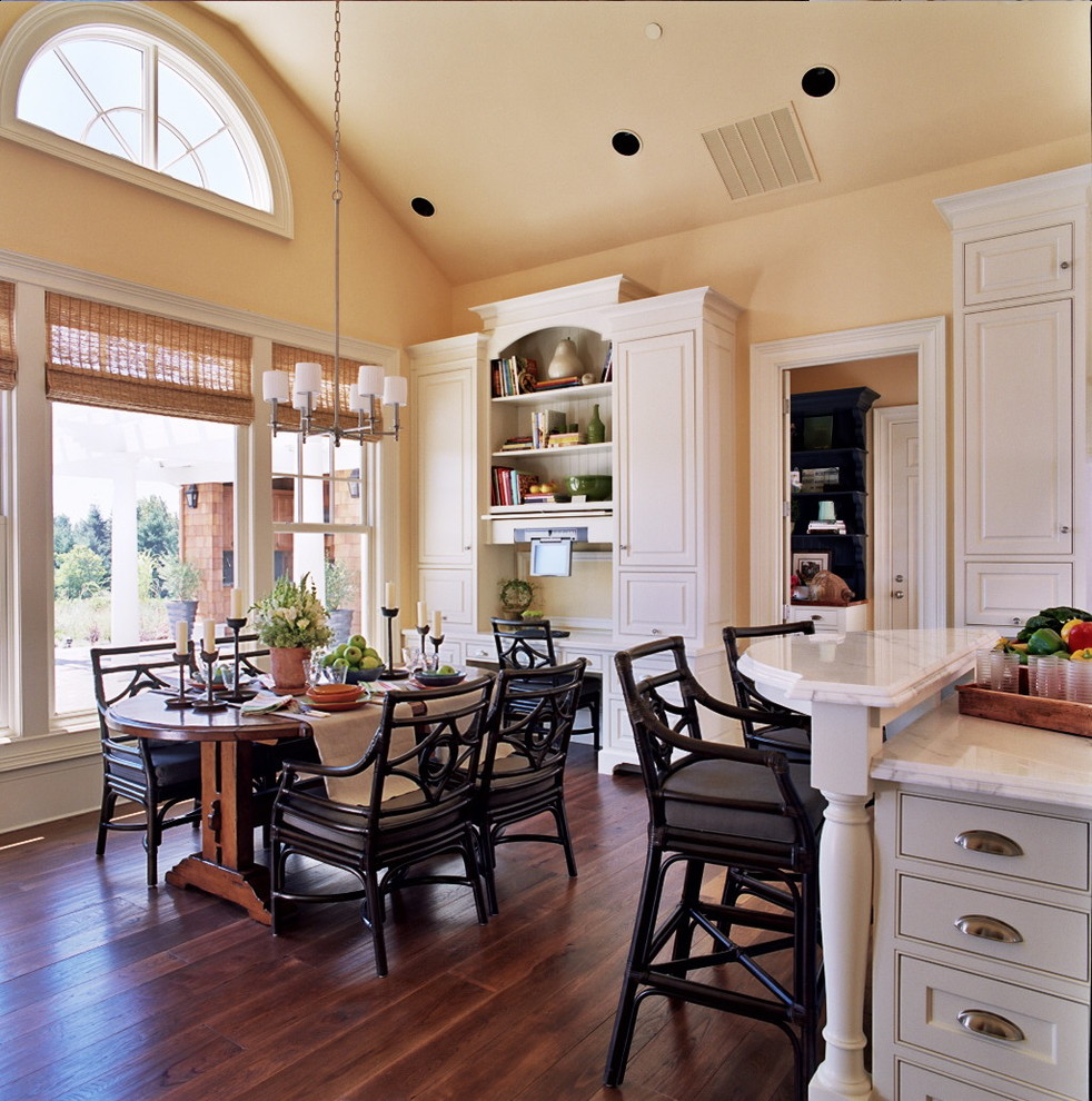 Inspiration for a traditional eat-in kitchen in Portland with beaded inset cabinets and white cabinets.