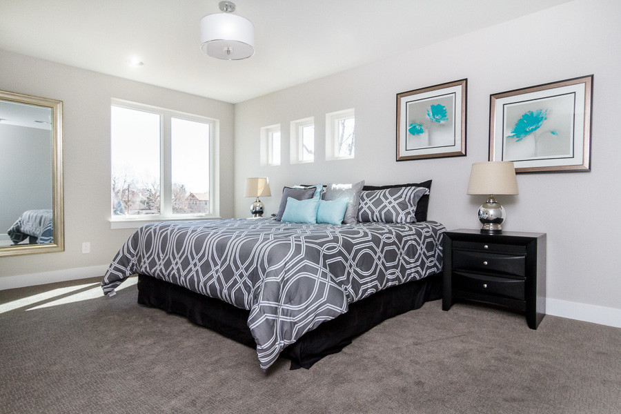 Photo of a modern bedroom in Denver.