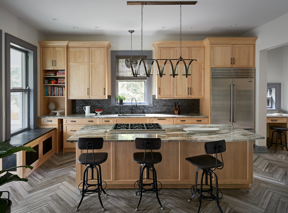 Kitchen - large transitional porcelain tile and brown floor kitchen idea in Other with a single-bowl sink, shaker cabinets, light wood cabinets, granite countertops, stainless steel appliances, black backsplash, subway tile backsplash, an island and multicolored countertops