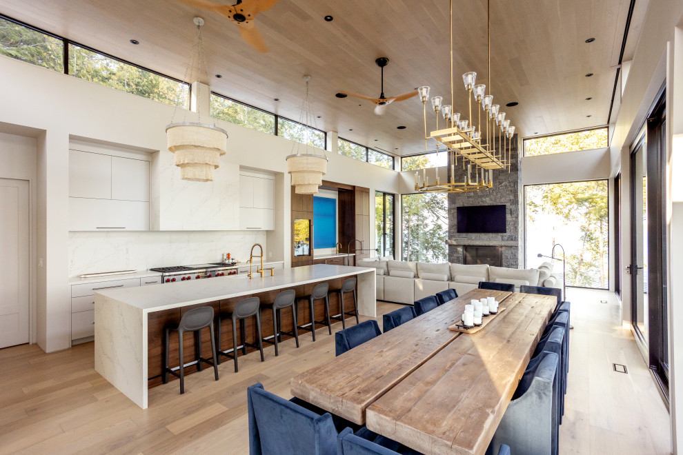 Contemporary dining room in Other with white walls, light hardwood flooring, beige floors and a wood ceiling.