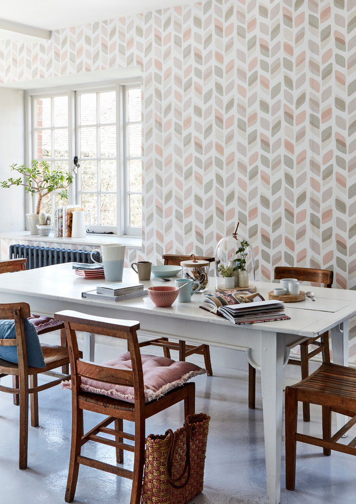 Photo of a country dining room in Sussex with multi-coloured walls.