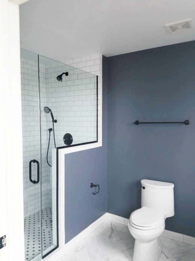 Photo of a mid-sized transitional master bathroom in Chicago with raised-panel cabinets, grey cabinets, a curbless shower, a two-piece toilet, white tile, ceramic tile, grey walls, mosaic tile floors, a drop-in sink, quartzite benchtops, white floor, a hinged shower door, white benchtops, a shower seat, a double vanity and a built-in vanity.