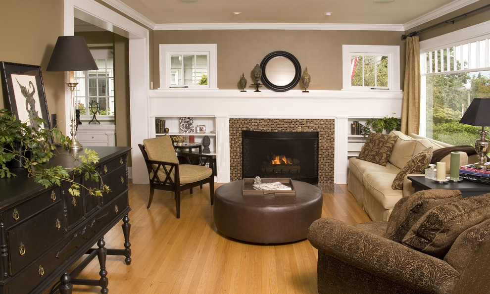 Design ideas for a traditional living room in Seattle with a tile fireplace surround.