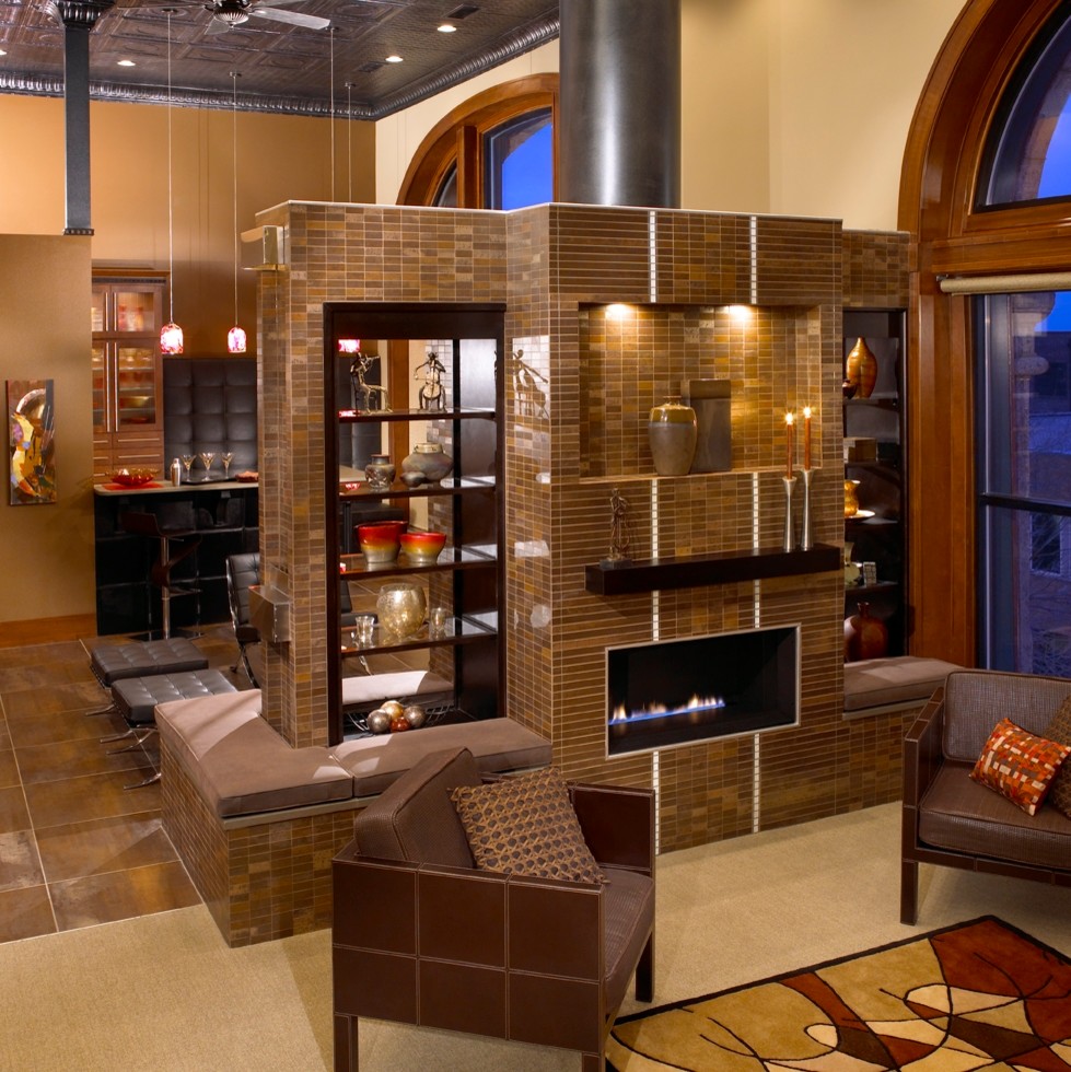 Photo of a mid-sized industrial formal open concept living room in Other with beige walls, carpet, a ribbon fireplace, a tile fireplace surround, no tv and beige floor.