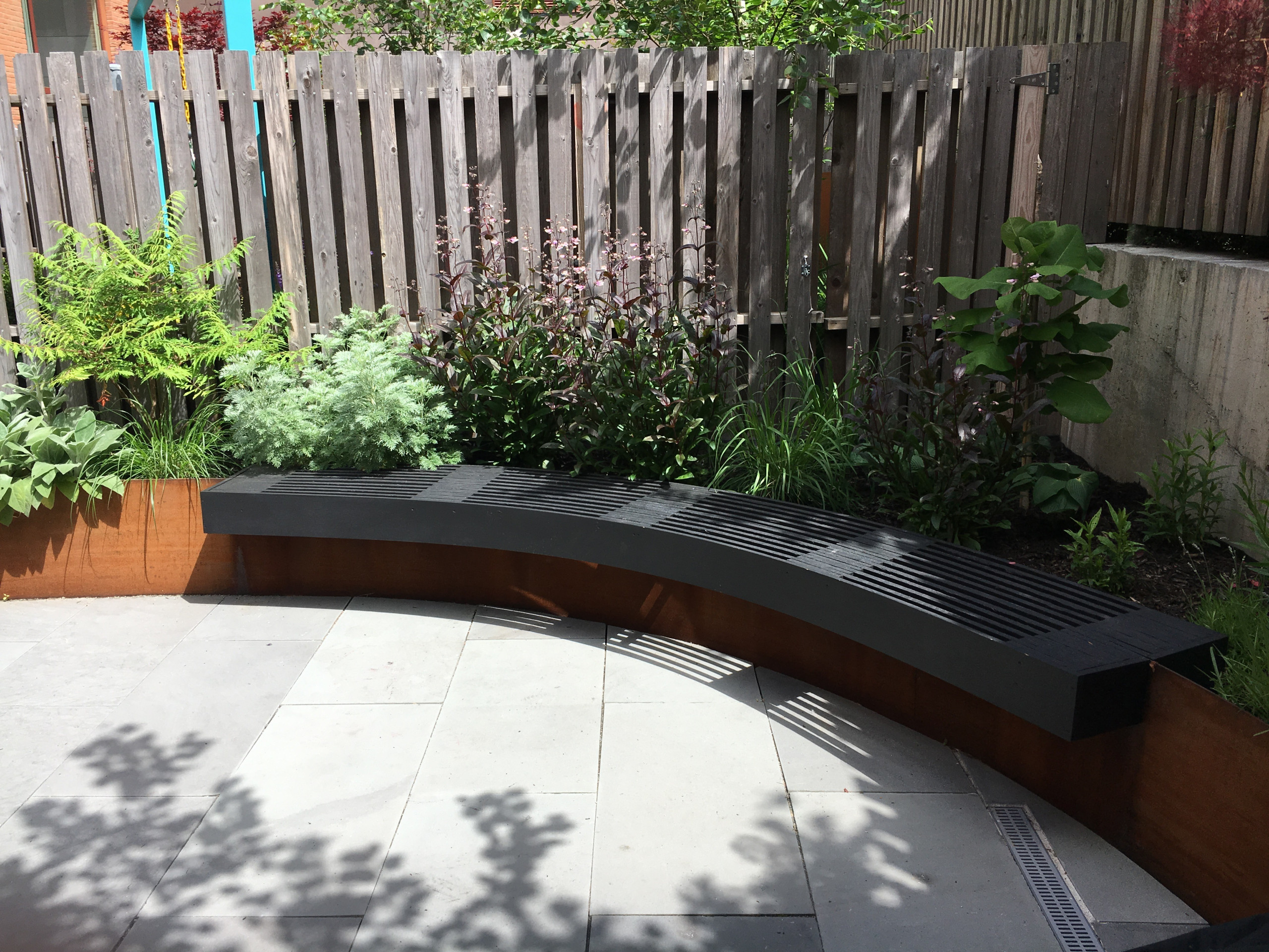 Modern Garden with Curved Corten Border