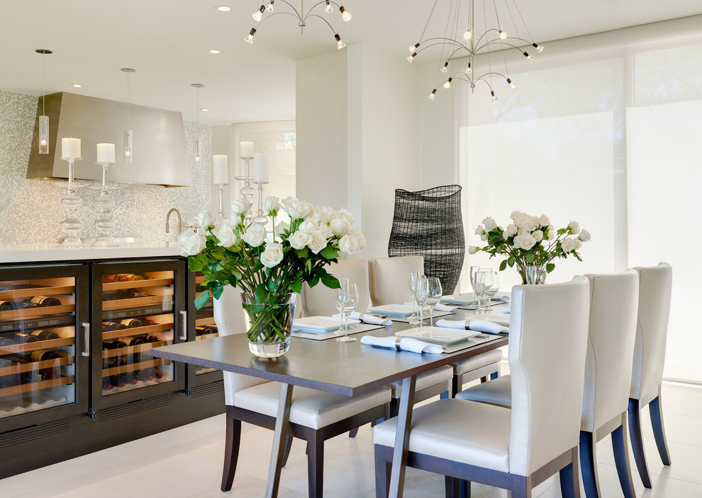 Inspiration for a contemporary dining room in Phoenix with white walls and dark hardwood floors.