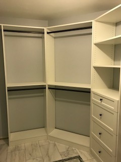 Large walk-in Closet with Shaker-Style Drawers and Double-Hang Space