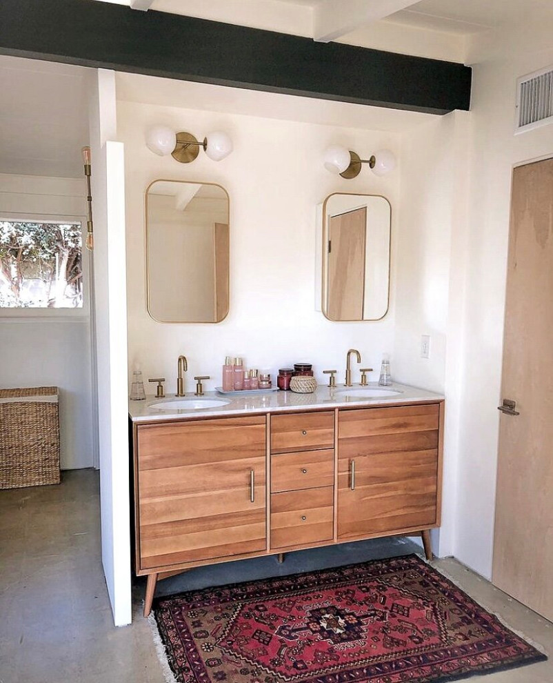 This is an example of a midcentury bathroom in Other with green tile.