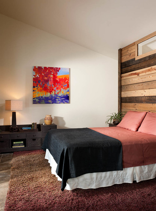 Bedroom with stunning reclaimed oak feature wall