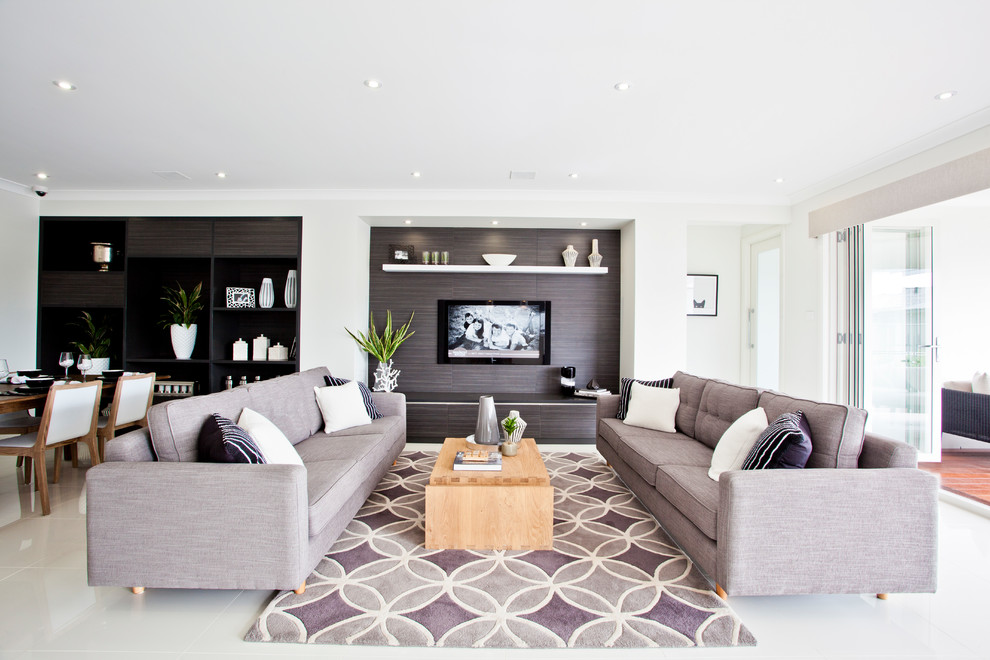 Inspiration for a large contemporary open concept living room in Newcastle - Maitland with grey walls, ceramic floors, no fireplace, a wall-mounted tv and grey floor.