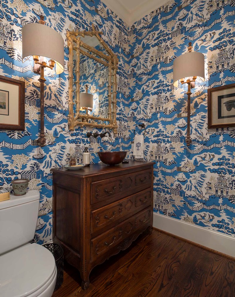 Powder room - dark wood floor powder room idea in Dallas with a vessel sink, furniture-like cabinets, dark wood cabinets, wood countertops and brown countertops