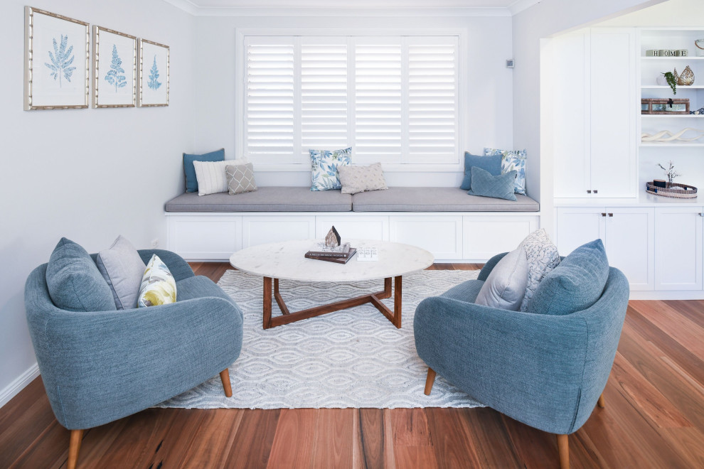 Inspiration for a beach style living room in Sydney.