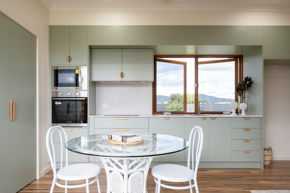 Design ideas for a contemporary open plan kitchen in Brisbane.