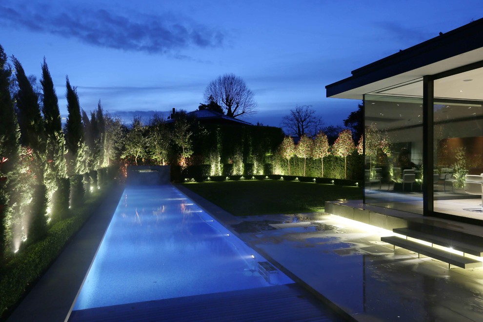 Photo of a contemporary pool in London.