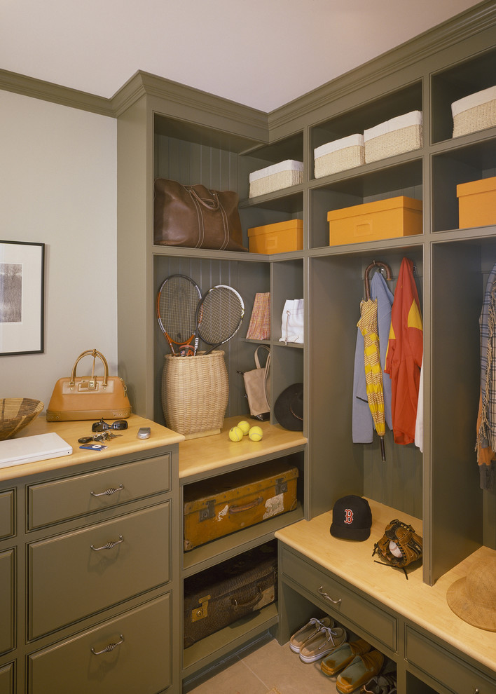 Design ideas for a traditional built-in wardrobe in Boston with open cabinets and green cabinets.