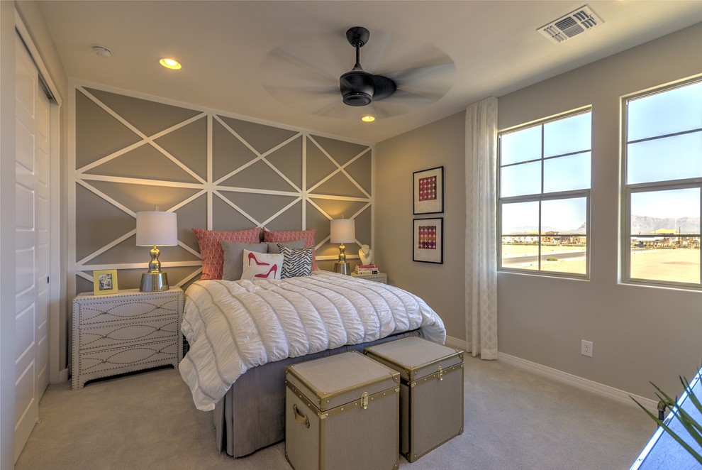 Design ideas for a mid-sized contemporary kids' room for girls in Phoenix with beige walls and carpet.