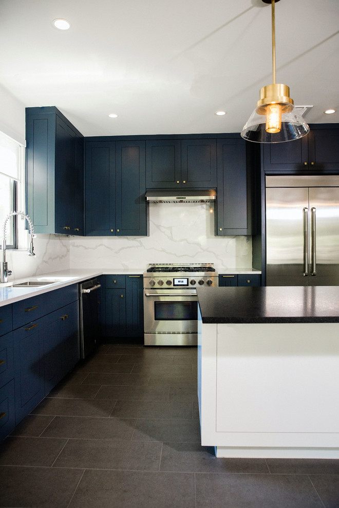 Mid-sized transitional l-shaped cement tile floor and gray floor eat-in kitchen photo in Austin with an undermount sink, flat-panel cabinets, blue cabinets, quartz countertops, white backsplash, stainless steel appliances, an island and white countertops