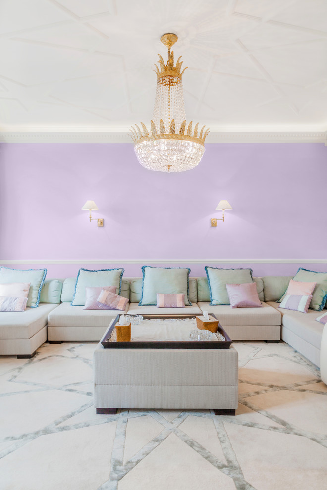 Design ideas for a transitional family room in Paris with purple walls.