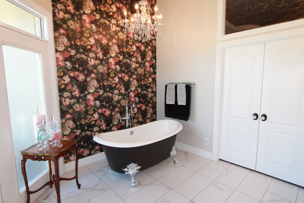 This is an example of an expansive victorian ensuite bathroom in Other with a built in vanity unit, raised-panel cabinets, white cabinets, a claw-foot bath, ceramic flooring, quartz worktops, white floors, a hinged door, white worktops, double sinks and wallpapered walls.