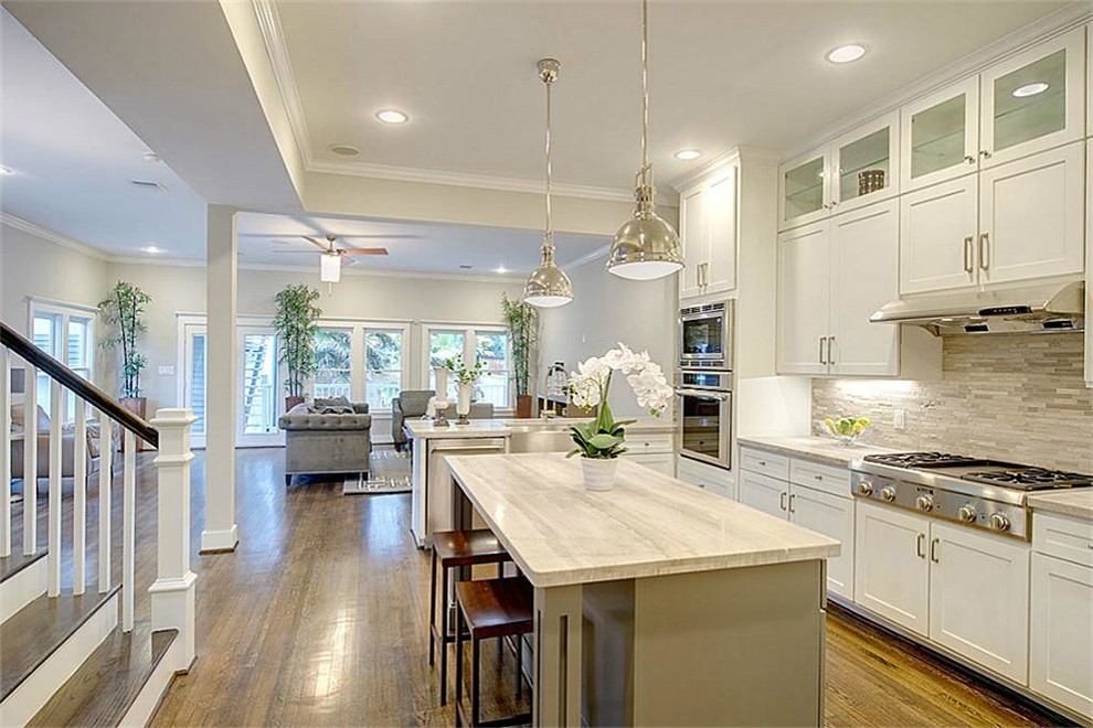 Design ideas for a transitional kitchen in Houston.