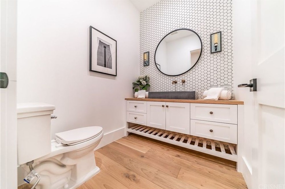 Small contemporary powder room in Other with shaker cabinets, white cabinets, a one-piece toilet, white tile, ceramic tile, white walls, wood benchtops and orange benchtops.