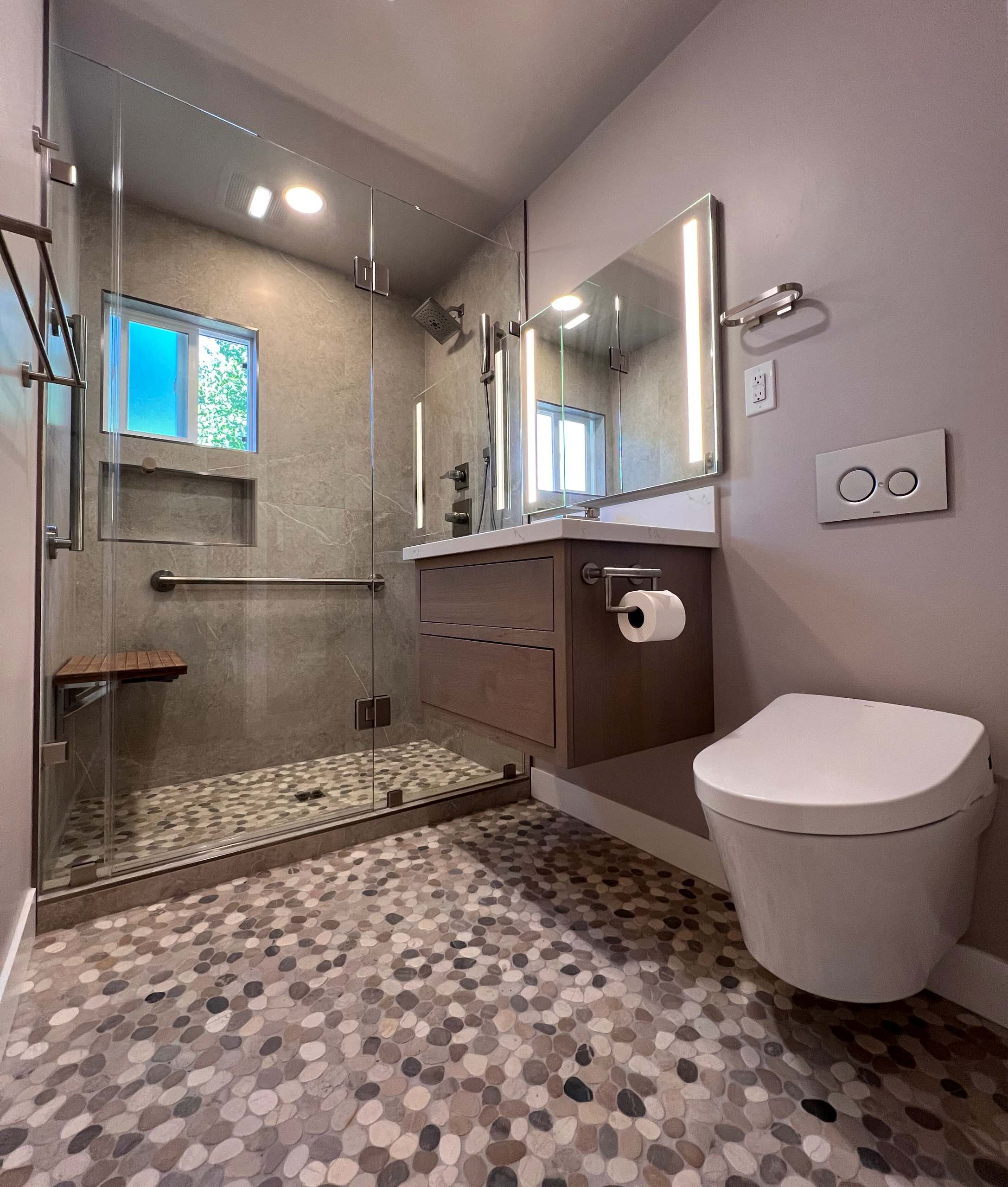 Tall Shower Enclosure, Raised Fixtures, Wall Hung Toto Toilet & Heated Floor