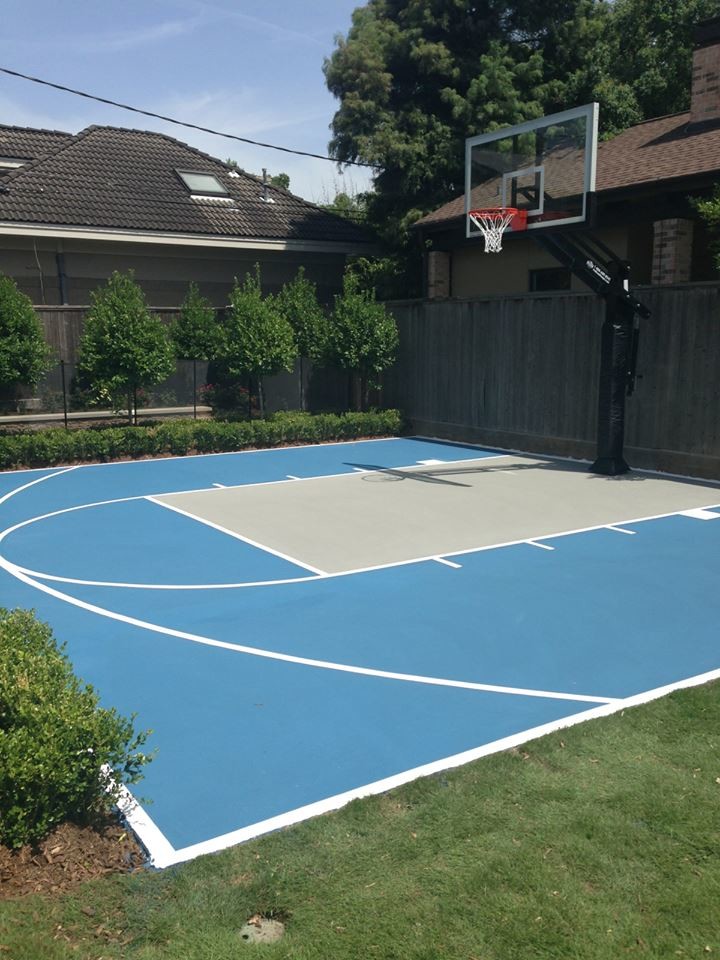Inspiration for a mid-sized traditional backyard partial sun outdoor sport court for summer in Austin with with outdoor playset and concrete pavers.