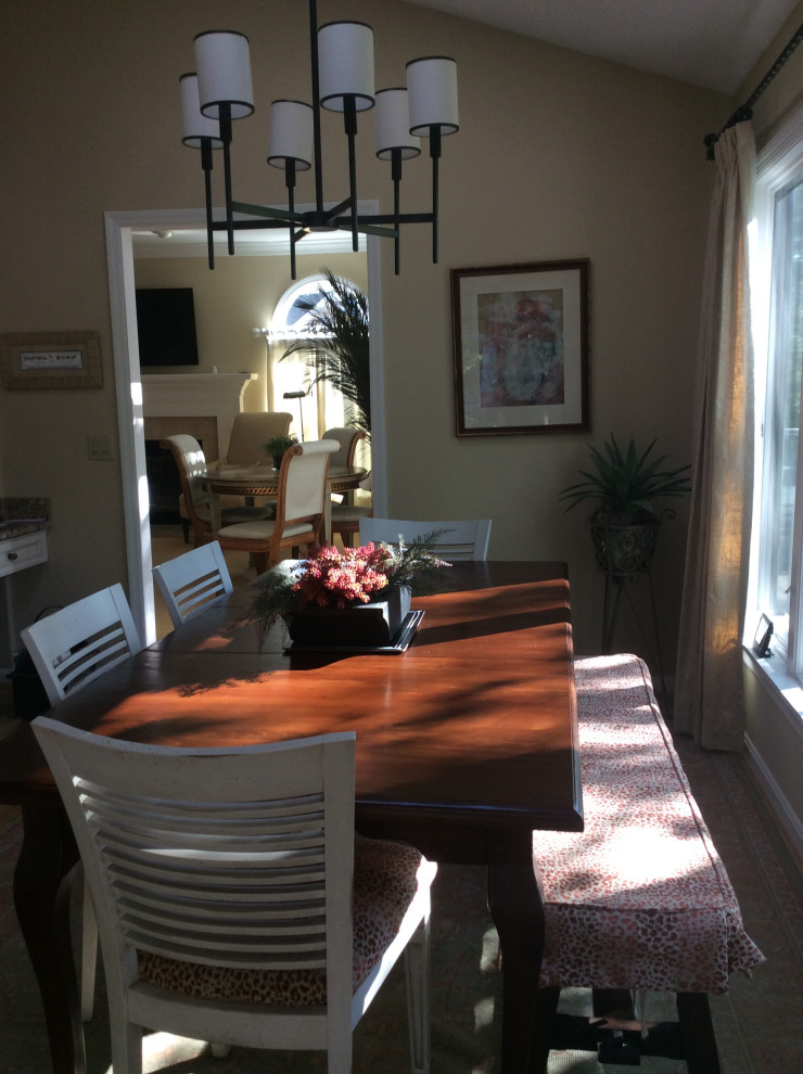 Great room - mid-sized transitional medium tone wood floor and brown floor great room idea in Columbus with beige walls