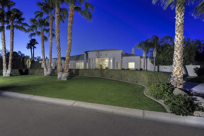 Inspiration for a huge transitional concrete floor front door remodel in Phoenix with beige walls and a glass front door