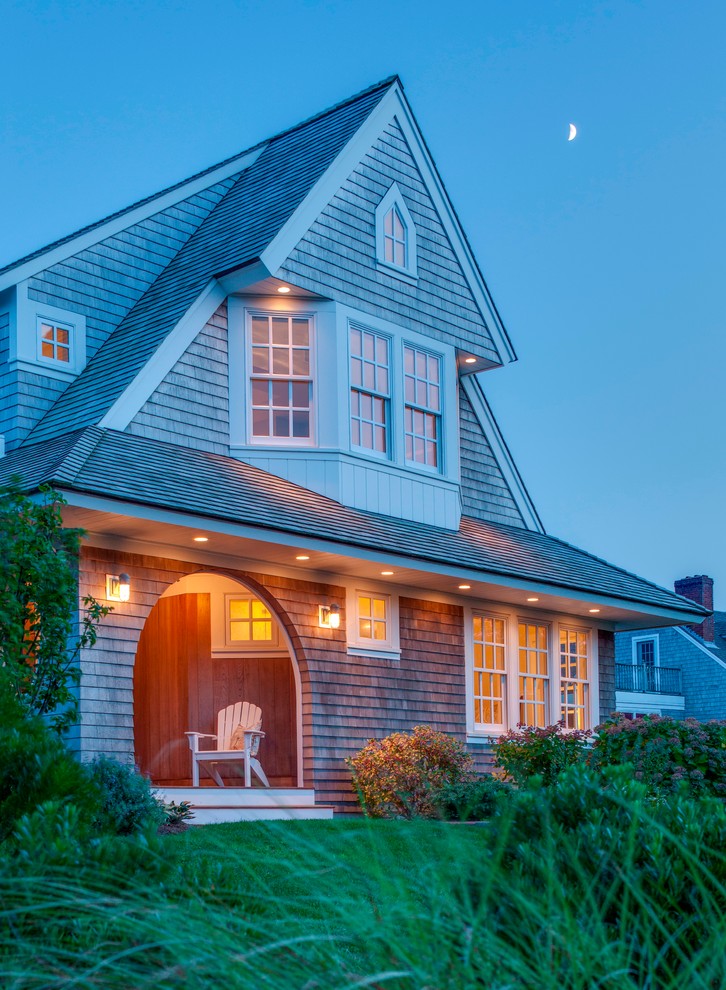Traditional exterior in Boston with wood siding and a gable roof.