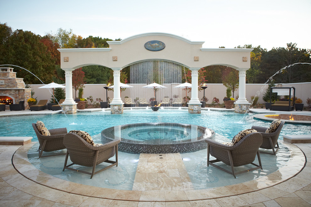 This is an example of a large traditional custom-shaped pool in Grand Rapids.