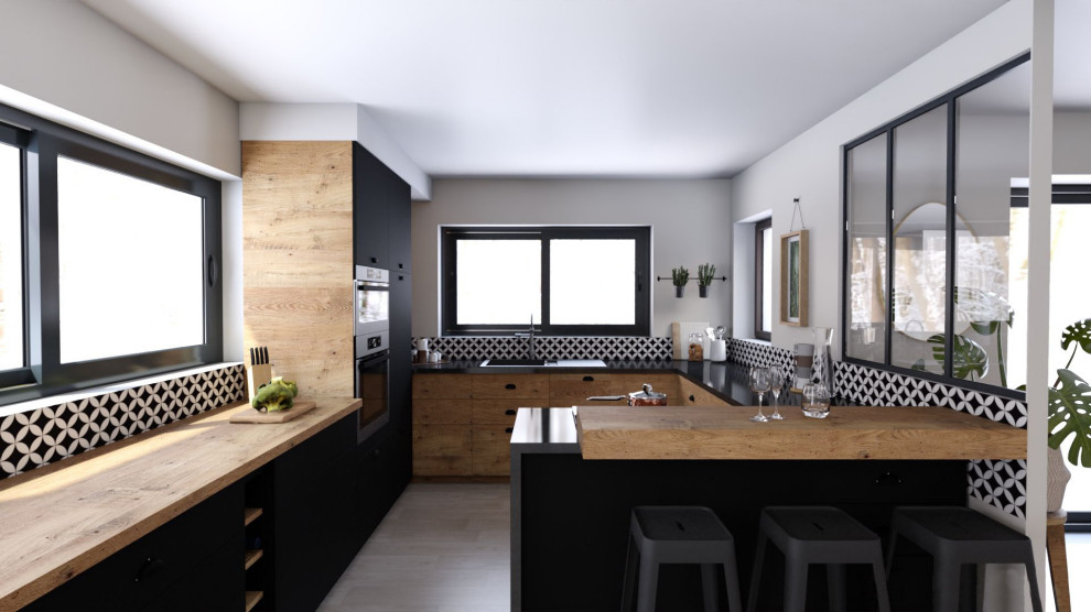 Inspiration for a large contemporary l-shaped open plan kitchen in Le Havre with an undermount sink, flat-panel cabinets, black cabinets, onyx benchtops, white splashback, cement tile splashback, black appliances, light hardwood floors, with island, brown floor and black benchtop.