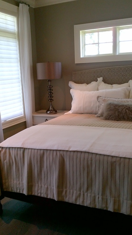Example of a large transitional guest medium tone wood floor home design design in Toronto with beige walls