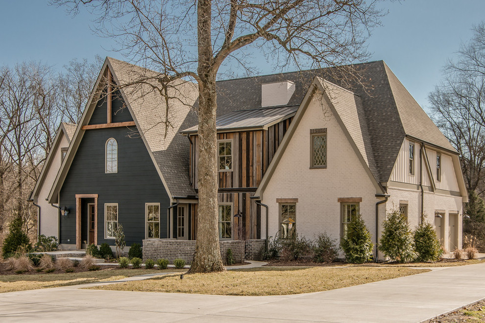 Design ideas for a transitional exterior in Nashville with wood siding.