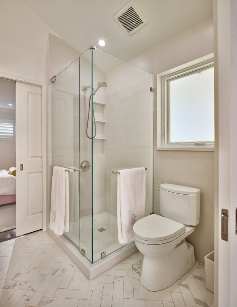 Inspiration for a mid-sized contemporary kids' porcelain tile, multicolored floor, double-sink, vaulted ceiling and wallpaper corner shower remodel in Dallas with flat-panel cabinets, a two-piece toilet, white walls, an undermount sink, quartz countertops, a hinged shower door, white countertops, a niche and a built-in vanity