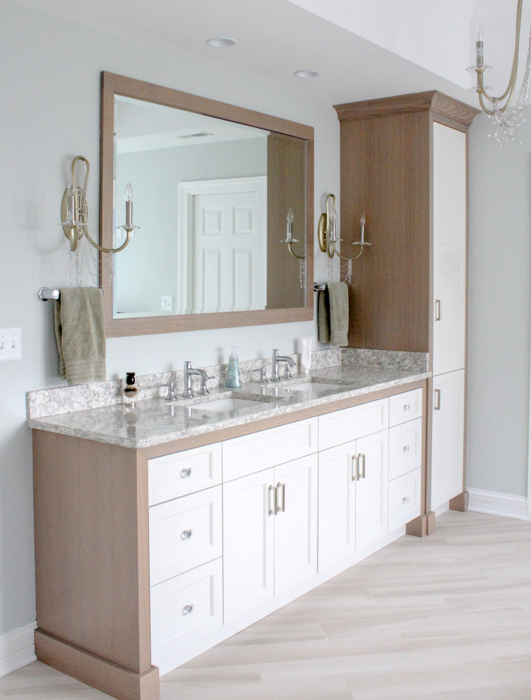 Mid-sized eclectic master bathroom in Chicago with flat-panel cabinets, light wood cabinets, grey walls, porcelain floors, engineered quartz benchtops, beige floor, beige benchtops, a double vanity and a built-in vanity.