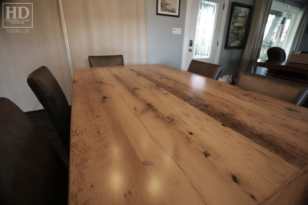 Example of a mountain style dining room design in Toronto