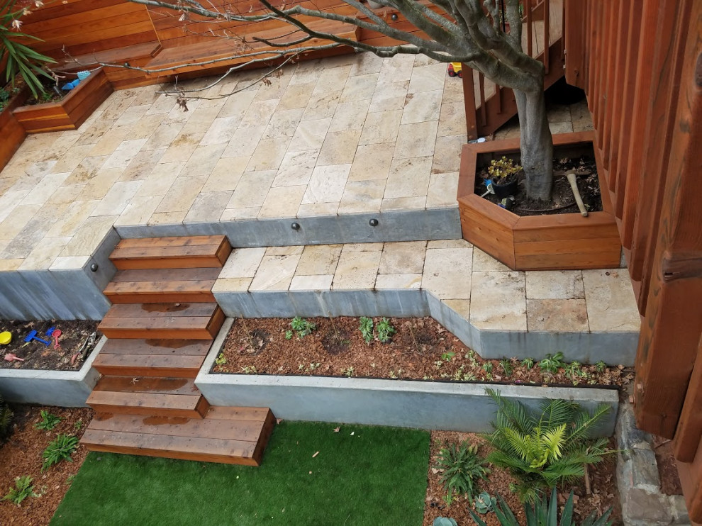 Raised Travertine Patio, Cement Walls with Redwood Appointments