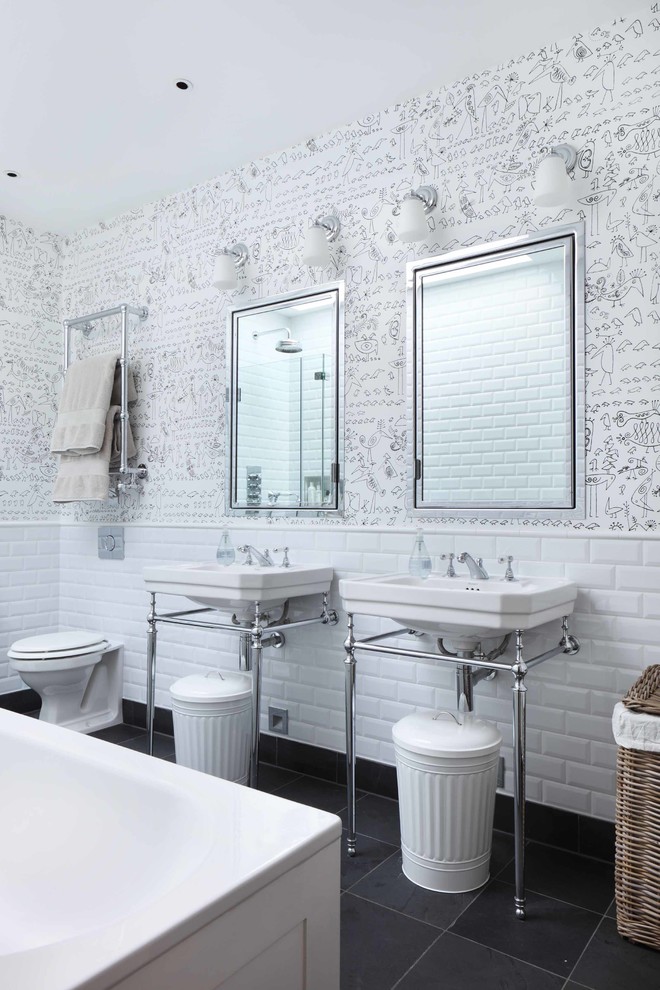 Contemporary bathroom in London with a console sink, white tile, subway tile and a one-piece toilet.