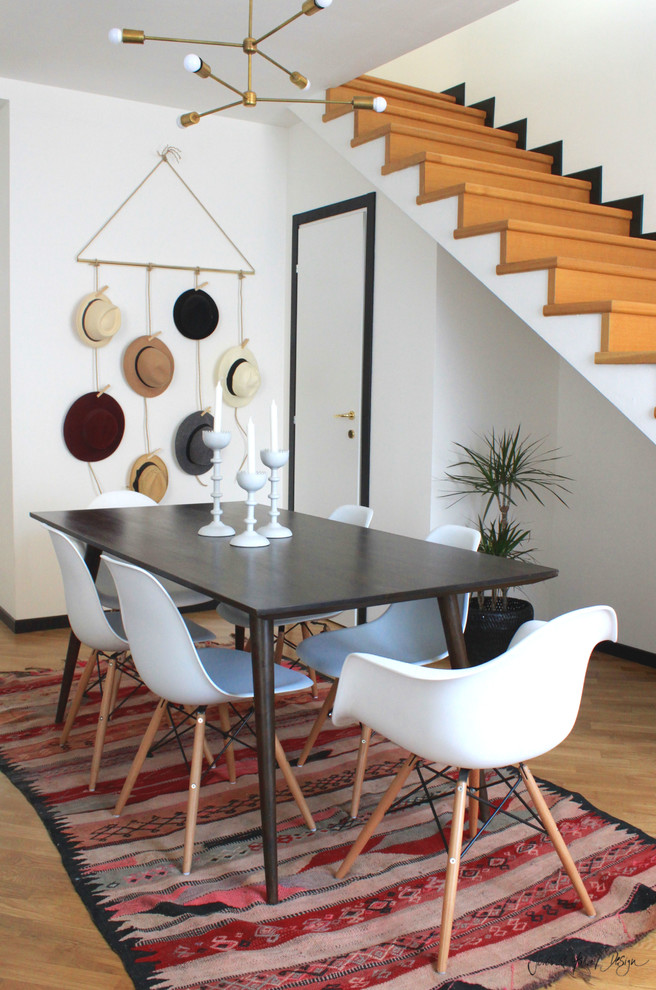 Great room - mid-sized eclectic light wood floor great room idea with white walls