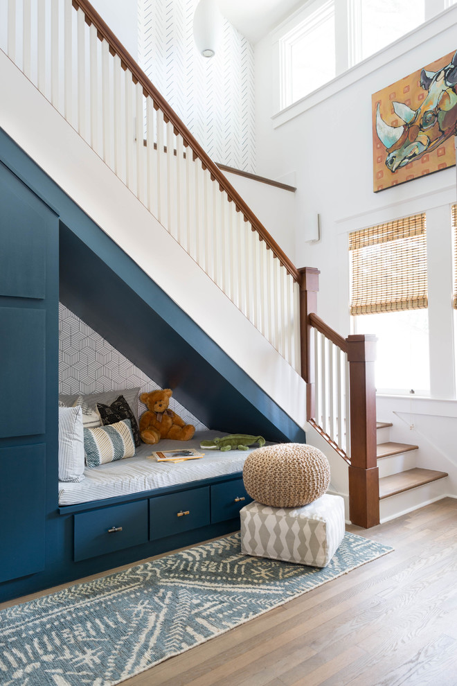 Design ideas for a transitional wood l-shaped staircase in Charleston with painted wood risers and wood railing.