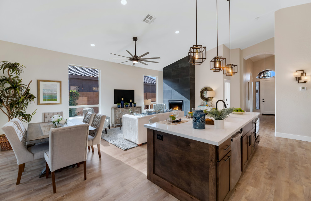 Kitchen - transitional vinyl floor and brown floor kitchen idea in Phoenix with shaker cabinets, dark wood cabinets, quartz countertops, an island and white countertops