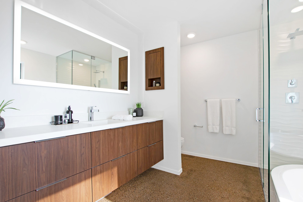 Inspiration for a mid-sized modern master bathroom in Grand Rapids with flat-panel cabinets, dark wood cabinets, a freestanding tub, a corner shower, white walls, cork floors, engineered quartz benchtops, brown floor, a hinged shower door, white benchtops and an integrated sink.