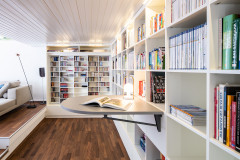 Das Bücherregal aufräumen und Bücher ausmisten - eine Professional