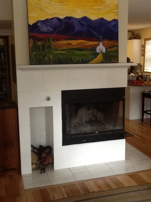 Change fireplace mantle and surround Need some ideas to refresh our fireplace. I painted the old oak mantle and 80