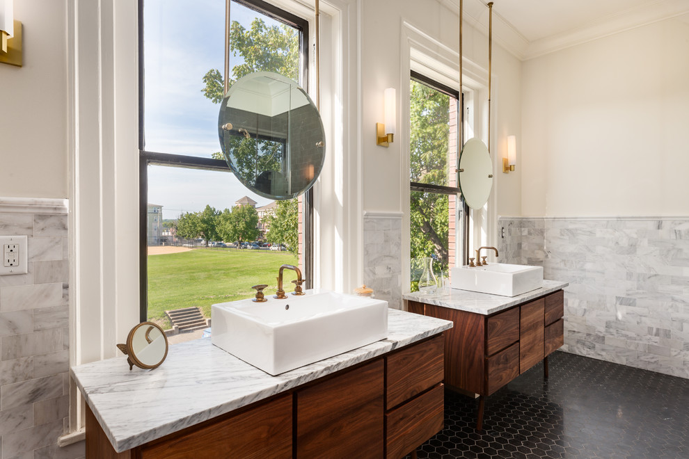 Transitional master bathroom in Nashville with dark wood cabinets, gray tile, white walls, a vessel sink, black floor, grey benchtops and flat-panel cabinets.