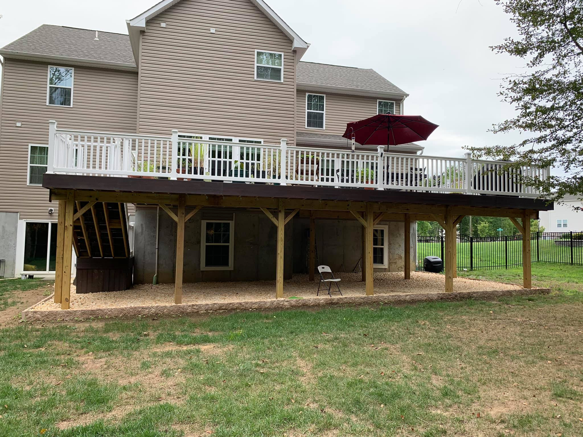 White Railing Lifted Deck