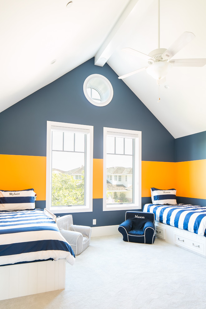 This is an example of a transitional kids' bedroom in Orange County with multi-coloured walls, carpet and white floor.